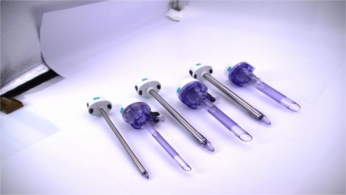 Que tipo de cooperação é necessária para a produção em massa de trocartes laparoscópicos?